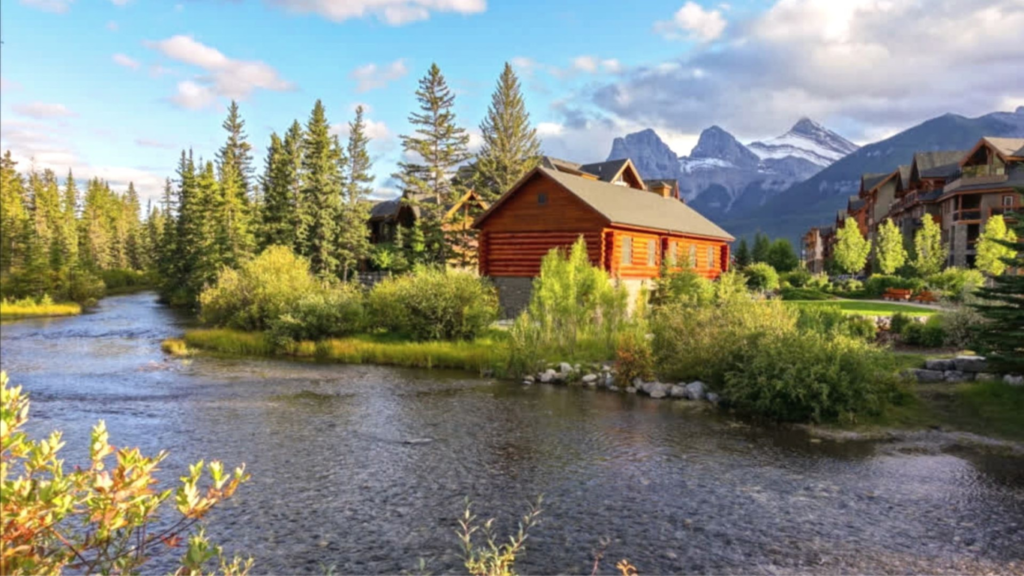 Spring Creek Alpine Village Landscape with Distant Three Sisters Mountain in Town of Canmore, Alberta Foothills of Canadian Rockies