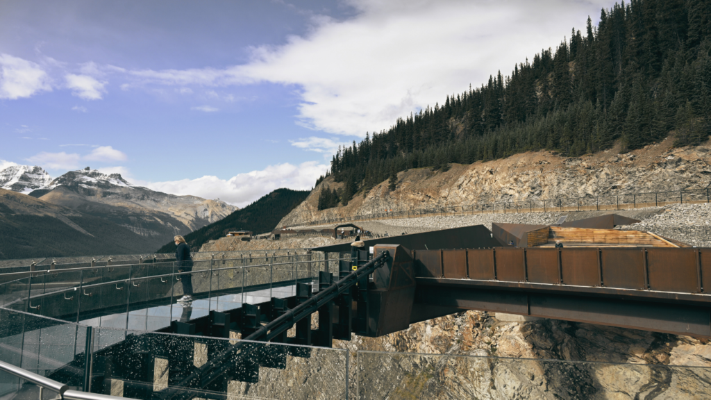 A Man Standing on Columbia Icefield Skywalk, Alberta