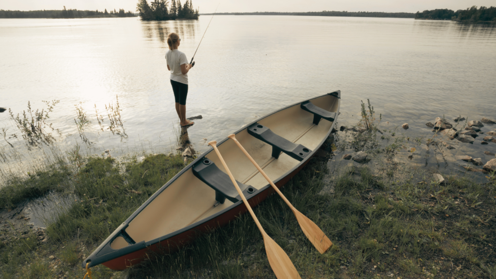 Women fishing, Whiteshell Provincial Park Manitoba