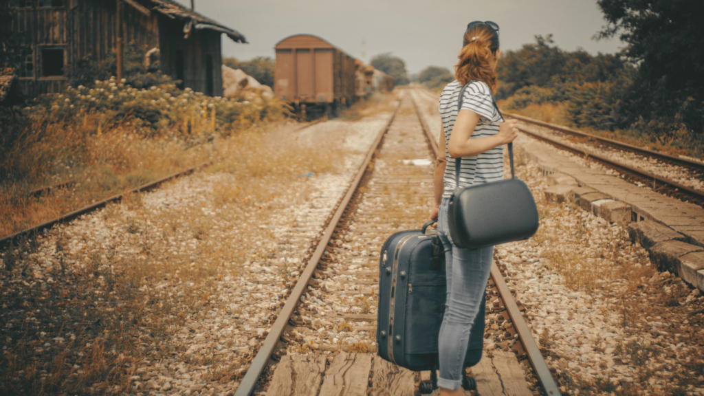 Woman traveling solo, At the railroad station